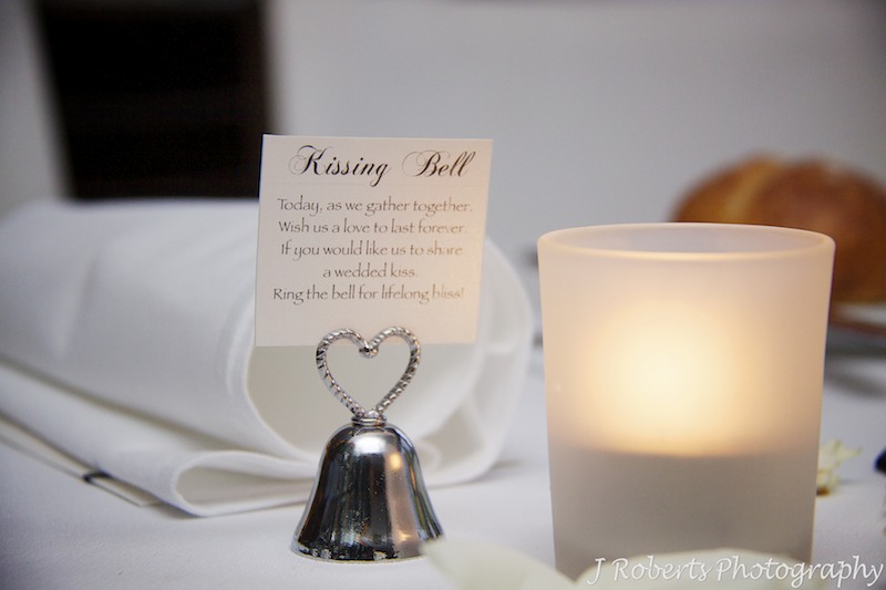 Kissing bell at wedding reception - wedding photography sydney